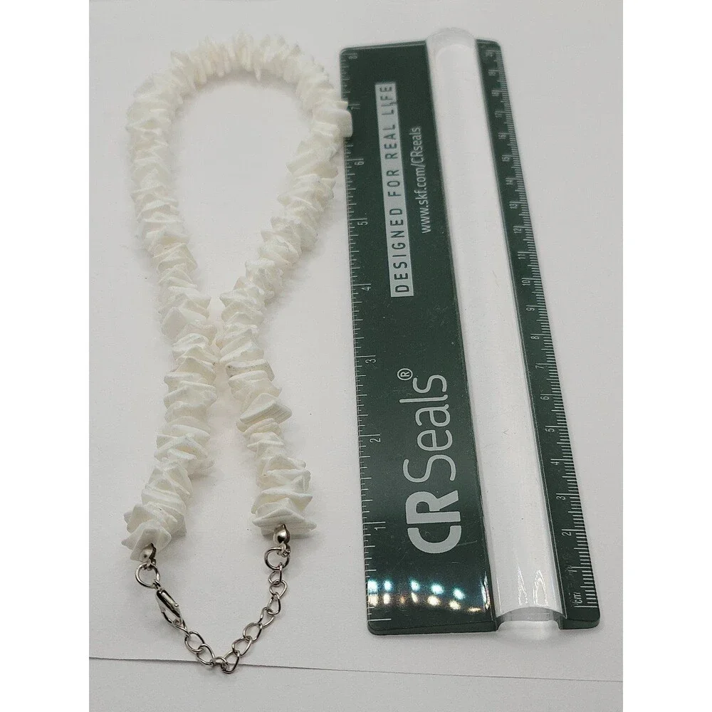 Light White puka shell necklace.